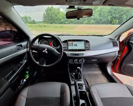 Красный Мицубиси Лансер, объемом двигателя 1.5 л и пробегом 227 тыс. км за 6700 $, фото 3 на Automoto.ua