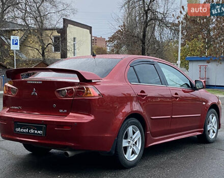 Красный Мицубиси Лансер, объемом двигателя 1.5 л и пробегом 120 тыс. км за 7699 $, фото 3 на Automoto.ua