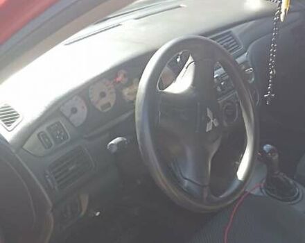 Мицубиси Лансер 2008 в Львове на Automoto.ua Красный Мицубиси Лансер, объемом двигателя 1.58 л и пробегом 280 тыс. км за 3200 $, фото 14 на Automoto.ua