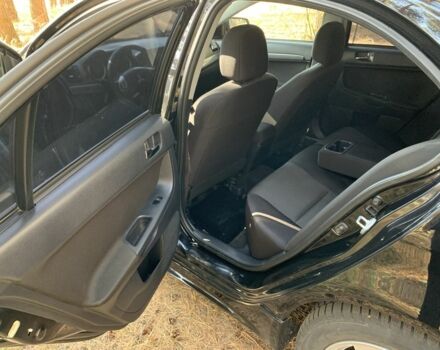 Мицубиси Лансер 2008 в Полтаве на Automoto.ua Красный Мицубиси Лансер, объемом двигателя 2 л и пробегом 170 тыс. км за 7200 $, фото 6 на Automoto.ua