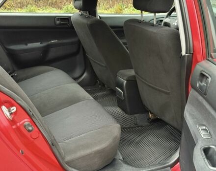 Червоний Міцубісі Lancer, об'ємом двигуна 1.6 л та пробігом 220 тис. км за 4600 $, фото 17 на Automoto.ua