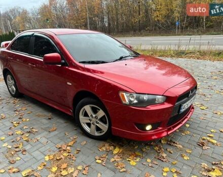 Красный Мицубиси Лансер, объемом двигателя 2 л и пробегом 197 тыс. км за 6500 $, фото 12 на Automoto.ua
