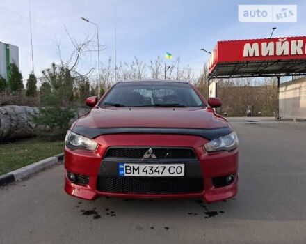 Червоний Міцубісі Lancer, об'ємом двигуна 2 л та пробігом 223 тис. км за 6950 $, фото 10 на Automoto.ua