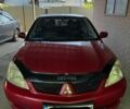 Червоний Міцубісі Lancer, об'ємом двигуна 1.6 л та пробігом 315 тис. км за 4584 $, фото 1 на Automoto.ua
