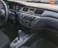 Червоний Міцубісі Lancer, об'ємом двигуна 1.58 л та пробігом 140 тис. км за 6000 $, фото 33 на Automoto.ua