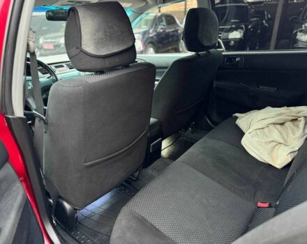 Красный Мицубиси Лансер, объемом двигателя 1.6 л и пробегом 215 тыс. км за 4500 $, фото 14 на Automoto.ua