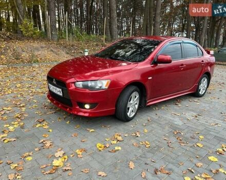 Красный Мицубиси Лансер, объемом двигателя 2 л и пробегом 197 тыс. км за 6500 $, фото 3 на Automoto.ua
