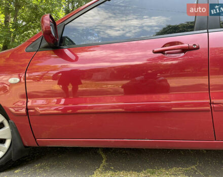 Червоний Міцубісі Lancer, об'ємом двигуна 1.6 л та пробігом 270 тис. км за 5699 $, фото 13 на Automoto.ua