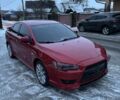 Красный Мицубиси Лансер, объемом двигателя 2 л и пробегом 181 тыс. км за 7750 $, фото 1 на Automoto.ua