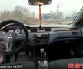 Красный Мицубиси Лансер, объемом двигателя 1.6 л и пробегом 175 тыс. км за 5300 $, фото 2 на Automoto.ua