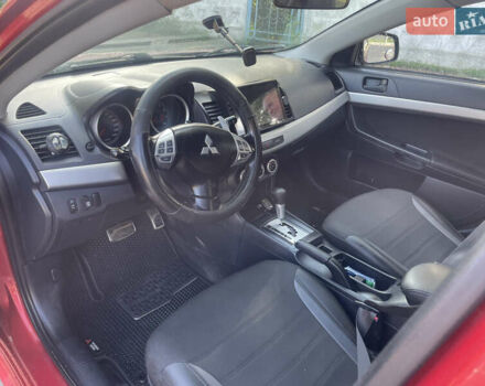 Червоний Міцубісі Lancer, об'ємом двигуна 2 л та пробігом 179 тис. км за 6499 $, фото 10 на Automoto.ua