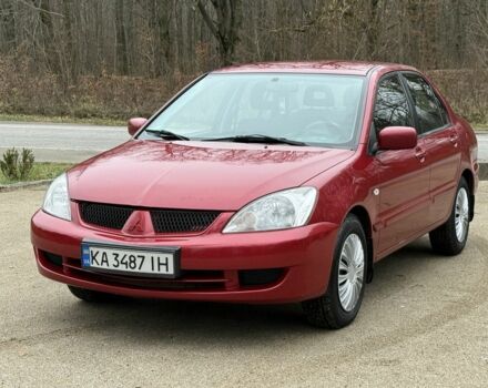 Червоний Міцубісі Lancer, об'ємом двигуна 1.6 л та пробігом 220 тис. км за 4600 $, фото 2 на Automoto.ua
