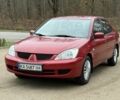 Червоний Міцубісі Lancer, об'ємом двигуна 1.6 л та пробігом 220 тис. км за 4600 $, фото 2 на Automoto.ua