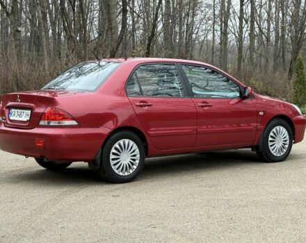 Червоний Міцубісі Lancer, об'ємом двигуна 1.6 л та пробігом 220 тис. км за 4600 $, фото 7 на Automoto.ua