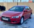 Красный Мицубиси Лансер, объемом двигателя 2 л и пробегом 170 тыс. км за 5200 $, фото 1 на Automoto.ua