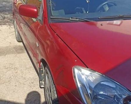 Мицубиси Лансер 2008 в Львове на Automoto.ua Красный Мицубиси Лансер, объемом двигателя 1.58 л и пробегом 280 тыс. км за 3200 $, фото 27 на Automoto.ua