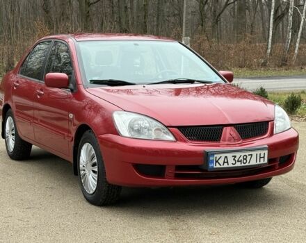 Червоний Міцубісі Lancer, об'ємом двигуна 1.6 л та пробігом 220 тис. км за 4600 $, фото 9 на Automoto.ua