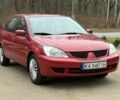 Червоний Міцубісі Lancer, об'ємом двигуна 1.6 л та пробігом 220 тис. км за 4600 $, фото 9 на Automoto.ua