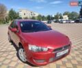 Красный Мицубиси Лансер, объемом двигателя 1.5 л и пробегом 220 тыс. км за 6300 $, фото 3 на Automoto.ua