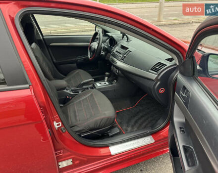 Червоний Міцубісі Lancer, об'ємом двигуна 2 л та пробігом 366 тис. км за 6500 $, фото 11 на Automoto.ua