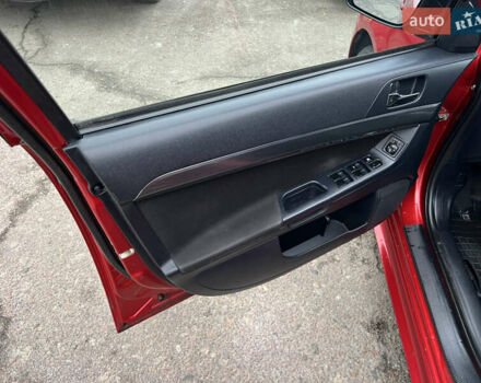 Красный Мицубиси Лансер, объемом двигателя 2 л и пробегом 330 тыс. км за 5250 $, фото 17 на Automoto.ua