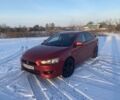 Красный Мицубиси Лансер, объемом двигателя 2 л и пробегом 223 тыс. км за 6000 $, фото 1 на Automoto.ua