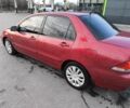 Червоний Міцубісі Lancer, об'ємом двигуна 1.6 л та пробігом 140 тис. км за 6000 $, фото 4 на Automoto.ua