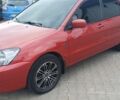 Червоний Міцубісі Lancer, об'ємом двигуна 1.6 л та пробігом 140 тис. км за 5900 $, фото 1 на Automoto.ua