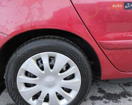 Червоний Міцубісі Lancer, об'ємом двигуна 1.58 л та пробігом 140 тис. км за 6000 $, фото 15 на Automoto.ua