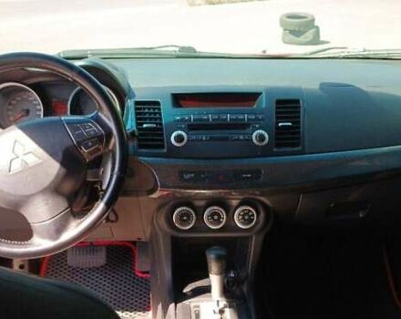 Мицубиси Лансер 2008 в Днепре (Днепропетровске) на Automoto.ua Красный Мицубиси Лансер, объемом двигателя 2 л и пробегом 140 тыс. км за 6200 $, фото 5 на Automoto.ua