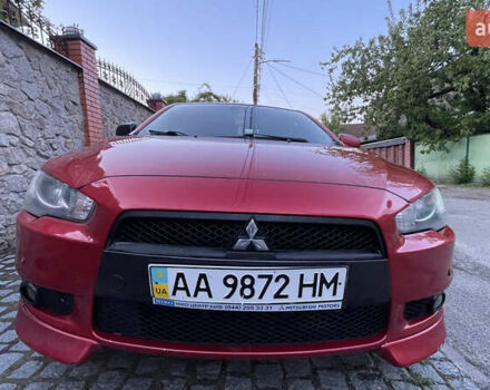 Міцубісі Lancer 2008 у Києві на Automoto.ua Червоний Міцубісі Lancer, об'ємом двигуна 2 л та пробігом 250 тис. км за 7000 $, фото 1 на Automoto.ua