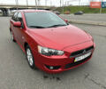 Червоний Міцубісі Lancer, об'ємом двигуна 2 л та пробігом 366 тис. км за 6500 $, фото 1 на Automoto.ua