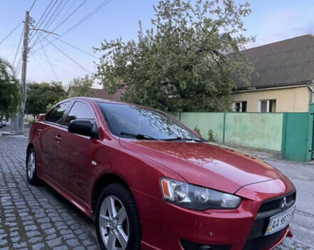 Міцубісі Lancer 2008 у Києві на Automoto.ua Червоний Міцубісі Lancer, об'ємом двигуна 2 л та пробігом 250 тис. км за 7000 $, фото 6 на Automoto.ua