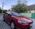 Міцубісі Lancer 2008 у Києві на Automoto.ua Червоний Міцубісі Lancer, об'ємом двигуна 2 л та пробігом 250 тис. км за 7000 $, фото 6 на Automoto.ua