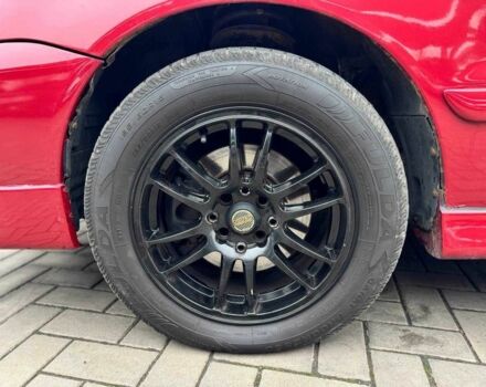 Красный Мицубиси Лансер, объемом двигателя 1.6 л и пробегом 215 тыс. км за 4500 $, фото 16 на Automoto.ua