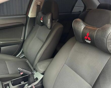 Червоний Міцубісі Lancer, об'ємом двигуна 2 л та пробігом 137 тис. км за 8500 $, фото 6 на Automoto.ua