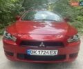 Красный Мицубиси Лансер, объемом двигателя 1.5 л и пробегом 124 тыс. км за 7100 $, фото 1 на Automoto.ua
