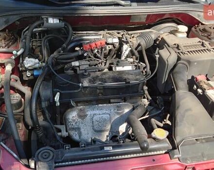 Красный Мицубиси Лансер, объемом двигателя 1.58 л и пробегом 198 тыс. км за 4650 $, фото 5 на Automoto.ua