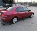 Червоний Міцубісі Lancer, об'ємом двигуна 1.6 л та пробігом 140 тис. км за 6000 $, фото 2 на Automoto.ua