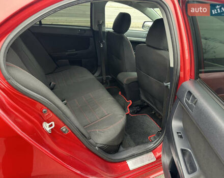 Червоний Міцубісі Lancer, об'ємом двигуна 2 л та пробігом 366 тис. км за 6500 $, фото 8 на Automoto.ua
