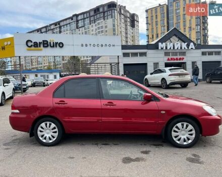 Червоний Міцубісі Lancer, об'ємом двигуна 1.58 л та пробігом 223 тис. км за 6400 $, фото 11 на Automoto.ua