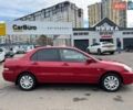 Червоний Міцубісі Lancer, об'ємом двигуна 1.58 л та пробігом 223 тис. км за 6400 $, фото 11 на Automoto.ua