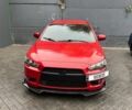 Червоний Міцубісі Lancer, об'ємом двигуна 2 л та пробігом 137 тис. км за 8500 $, фото 1 на Automoto.ua