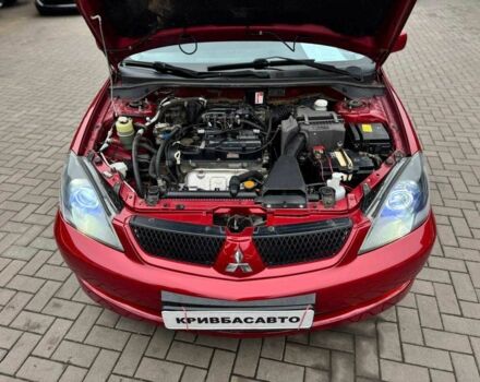Красный Мицубиси Лансер, объемом двигателя 1.6 л и пробегом 215 тыс. км за 4500 $, фото 3 на Automoto.ua