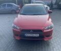 Червоний Міцубісі Lancer, об'ємом двигуна 2 л та пробігом 200 тис. км за 5350 $, фото 1 на Automoto.ua