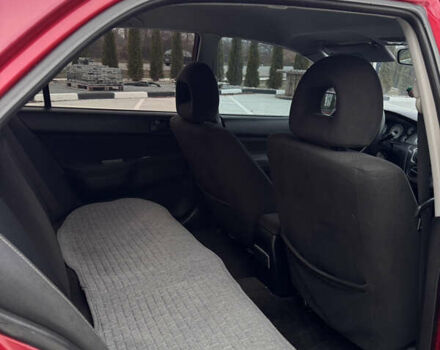 Красный Мицубиси Лансер, объемом двигателя 1.6 л и пробегом 276 тыс. км за 4550 $, фото 13 на Automoto.ua