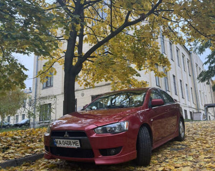 Червоний Міцубісі Lancer, об'ємом двигуна 2 л та пробігом 203 тис. км за 8000 $, фото 2 на Automoto.ua