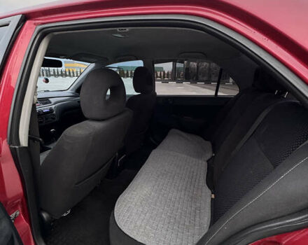 Красный Мицубиси Лансер, объемом двигателя 1.6 л и пробегом 276 тыс. км за 4550 $, фото 12 на Automoto.ua