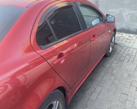 Червоний Міцубісі Lancer, об'ємом двигуна 2 л та пробігом 200 тис. км за 5350 $, фото 6 на Automoto.ua