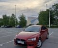 Червоний Міцубісі Lancer, об'ємом двигуна 2 л та пробігом 200 тис. км за 8000 $, фото 1 на Automoto.ua
